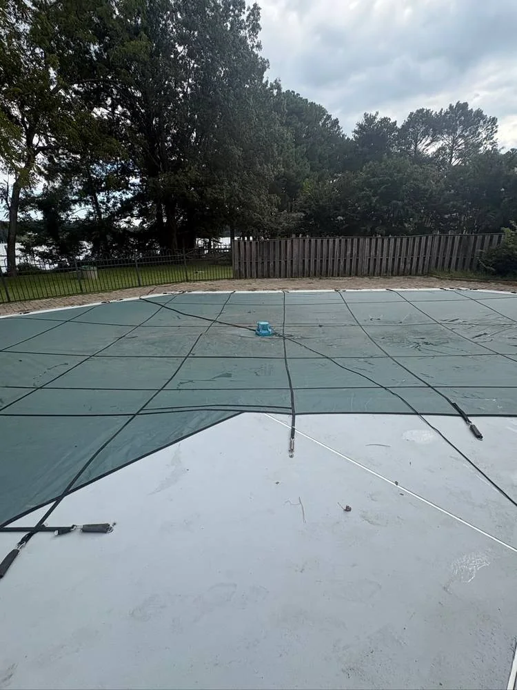 Green cover on a pool following a Pool Store closing and winterization visit