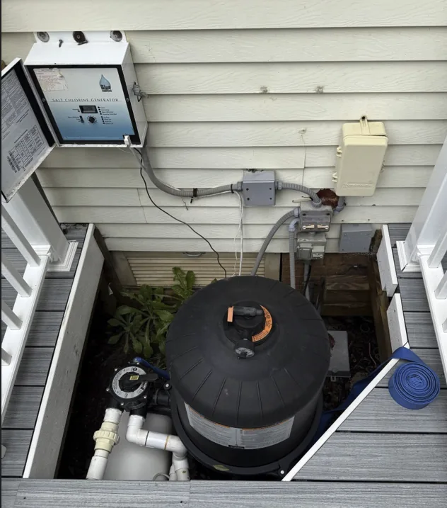 Pool filter and controls in a confined equipment area during an inspection